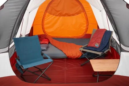 he REI Wonderland Tent is truly a sight to behold. It's huge! There are two bedrooms, a living room, and a kitchen, all beautifully appointed. The tent even has a fireplace!