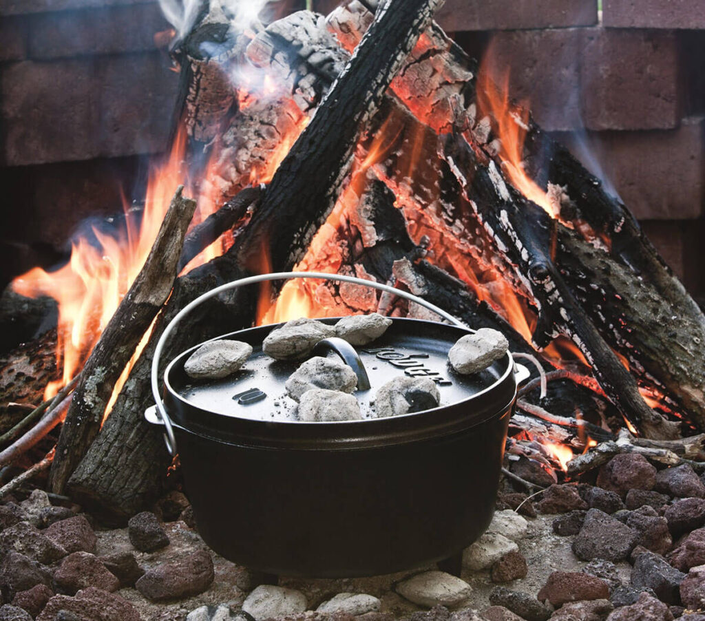 This Lodge Dutch oven is a budget-friendly option that doesn't compromise on quality. It includes all the must-have features, like legs, a handle, and a lid with a rim. Plus, it has legs on the lid so you can use it as a griddle
